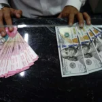 Rupiah Melemah Tipis 0,04 Persen, Pasar Pantau Pergerakan Dolar AS