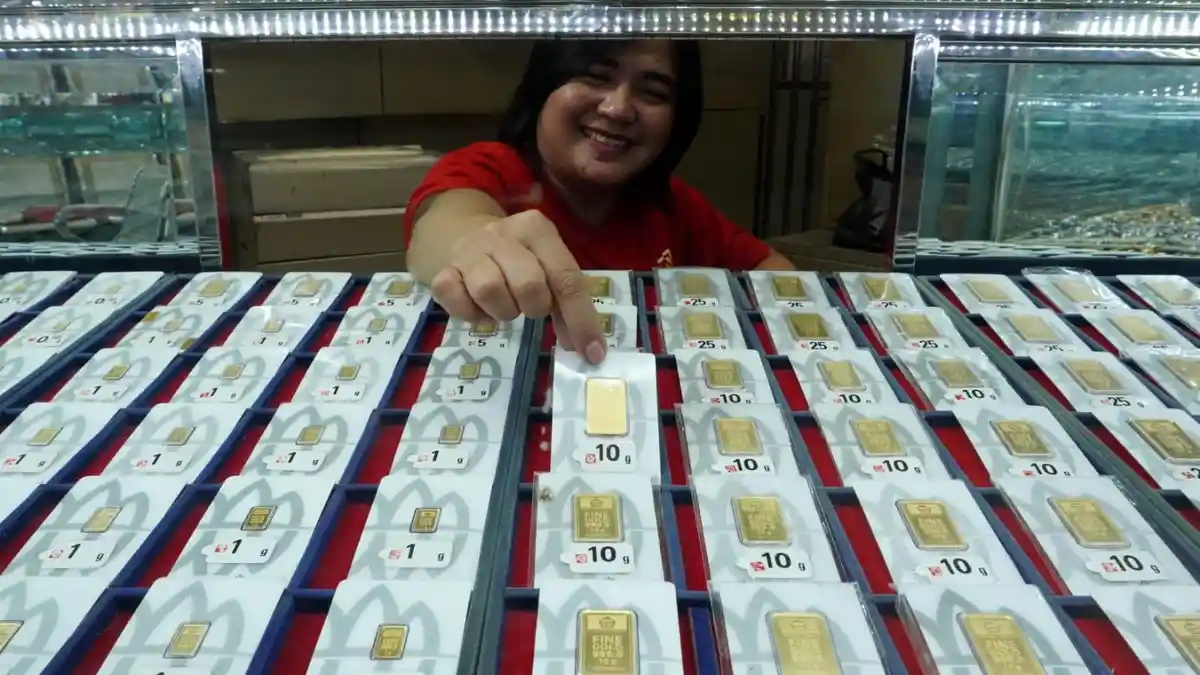 Harga Emas Antam Turun ke Rp2.564.000 per Gram, Buyback Jadi Rp2.379.000